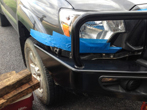 Little protection tape was laid down to keep from scratching the body of the truck